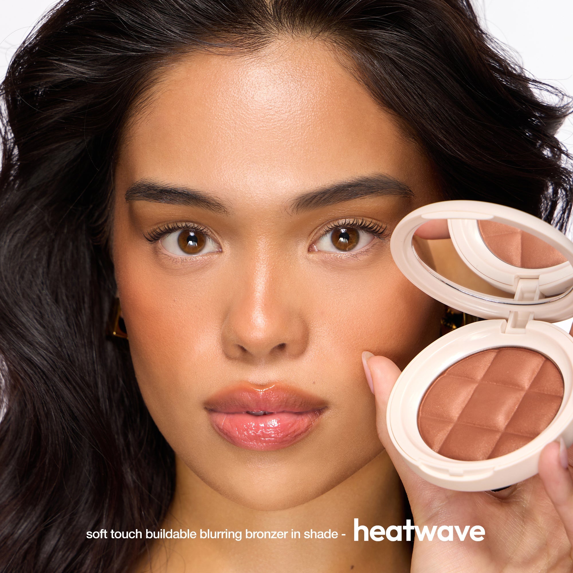 colour_Heatwave, | ICONIC London Fridays Buildable Blurring Bronze. Model wearing bronzer